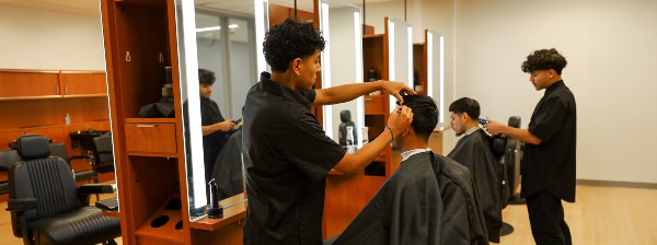 Barber Photo 2 Barber Students cutting hair for costumers